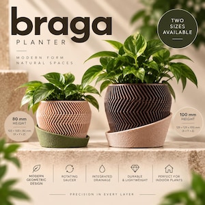 May include: Two Braga planters with geometric chevron patterns, each holding a green plant. The smaller planter is light pink with an olive green saucer, 103 x 103 x 80 mm. The larger planter is dark brown with a light pink saucer, 129 x 129 x 100 mm.