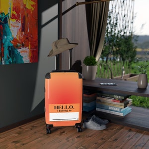 Maleta naranja roja: equipaje de mano único y equipaje facturado grande, regalo de viaje