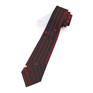 May include: A black tie with a red circuit board pattern. The tie has a white lining.