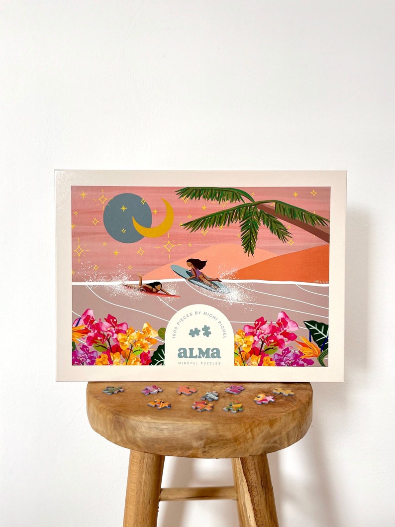 Get ready for Michi Pichel's "Paradise"! The vibrant colors of this beautiful artwork are perfect for cloudy days when we feel like nothing else can lift our mood. Let this puzzle take you on a relaxing surf trip, piece by piece.