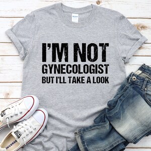 I&#39;m Not A Gynecologist But I&#39;ll Take A Look TShirt, Funny Saying Unisex Shirt, Vintage Gag Gift T-Shirt, Gifts for Him or Her
