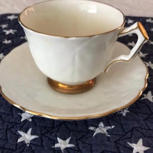 vintage Aynsley Golden Crocus pattern china teacup and saucer