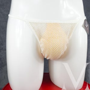 May include: White mesh underwear with a white elastic waistband. The underwear is on a white mannequin.