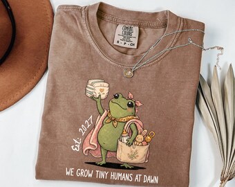 Frog Pregnancy Announcement T-Shirt: We Grow Tiny Humans at Dawn, Est 2027, Comfort Colors®