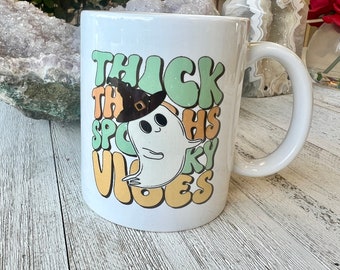 Thick thighs spooky vibes coffee or tea mug