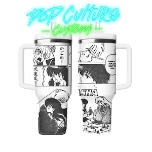 May include: A stainless steel travel mug with a white background and black and white manga style illustrations of characters from the anime series Inuyasha. The text "Inuyasha" is visible on the mug. The mug has a black handle and a black lid.