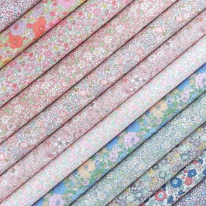 Confezione di tessuti Liberty ~ Meadow Song / Tana Lawn™, strisce di cotone per trapuntatura con ciondolo a forma di quarto di grasso - rosa pastello, blu, giallo, primavera, arcobaleno