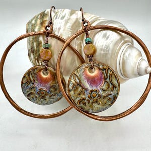 Large copper hoops with artisan ceramic floral charms, big antique copper earrings with pink blue round ceramic charms and pink Czech glass