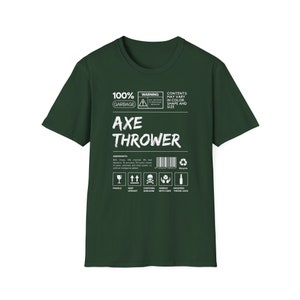 May include: A dark green t-shirt with a white graphic design that reads "100% Garbage Axe Thrower". The graphic is a parody of a product label with warnings and ingredients.