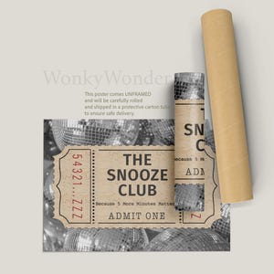 May include: A vintage-style ticket with the text "The Snooze Club" and "Because 5 More Minutes Matter" in red text. The ticket is surrounded by silver disco balls.