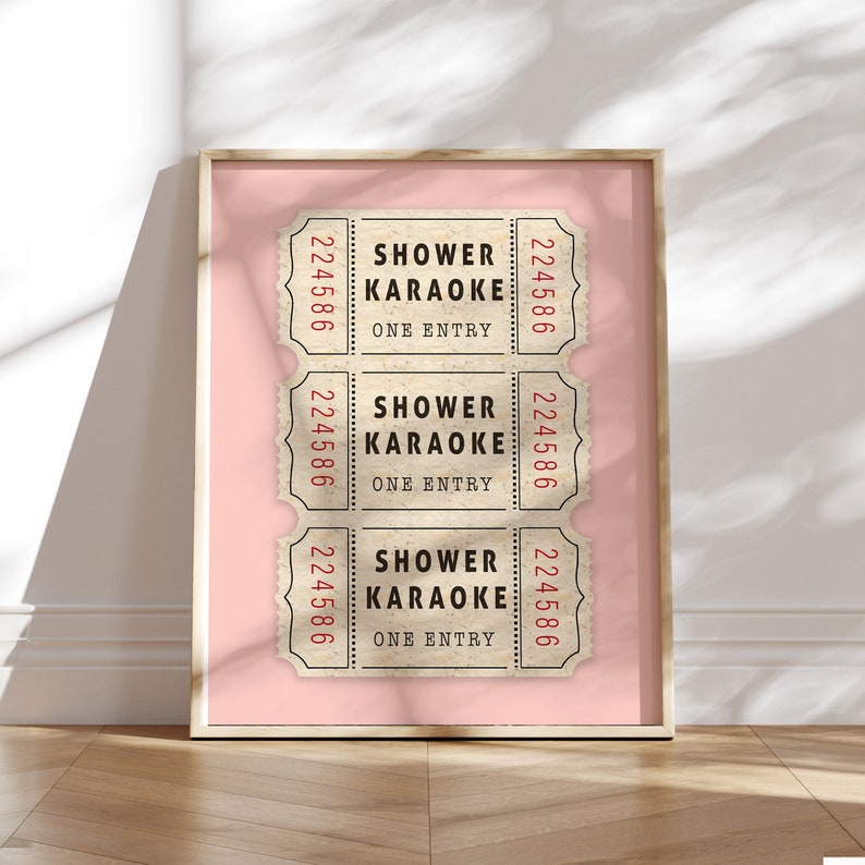 May include: Three vintage-style tickets with the text "Shower Karaoke" and "One Entry" printed on them. The tickets are on a pink background.