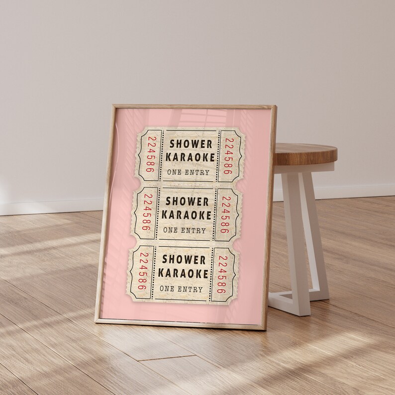 May include: Three vintage-style tickets with the text "Shower Karaoke" and the number "224586" printed on each. The tickets are on a pink background.