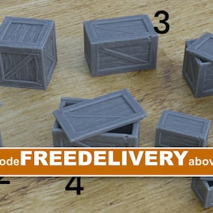 May include: A collection of eight small gray miniature crates with wood grain textures, some featuring removable lids. The crates are numbered one through six and eight, and are arranged in a group. The image includes the text FREEDELIVERY.