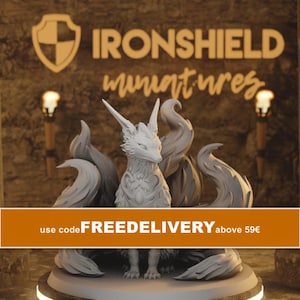 May include: A light grey miniature figurine of a multi-tailed fox creature with pointed ears and intricate chest detailing. The background features the text IRONSHIELD miniatures and a shield logo. An orange banner displays the text use code FREEDELIVERY above 59€.