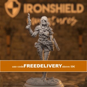 May include: A grey miniature figurine of a character with pointed ears, wearing a face mask, layered armor, and a belt with a holster, holding a pistol in one raised hand. The figure stands on a circular base with a textured, rocky surface.