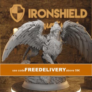 May include: A light gray, detailed figurine of a sphinx with large, feathered wings and an ornate headpiece. The creature stands on a circular base. In the background, the text IRONSHIELD is visible above the figure, with a shield-shaped logo.