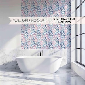 May include: A white bathtub sits in a bathroom with a marble floor and walls. The back wall features a wallpaper mockup with a floral pattern in shades of blue, pink, and white. The text "WALLPAPER MOCKUP" and "Smart Object PSD INCLUDED" is displayed above the wallpaper.