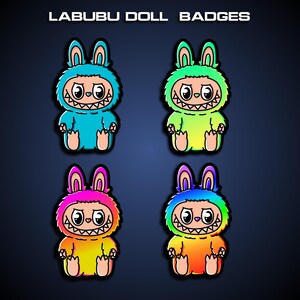 May include: Four colorful Labubu doll badges. Each badge features a cartoon-style monster with a toothy grin and bunny ears. The badges are in shades of blue, green, pink, and rainbow colors, with a black outline. The text "LABUBU DOLL BADGES" is at the top.