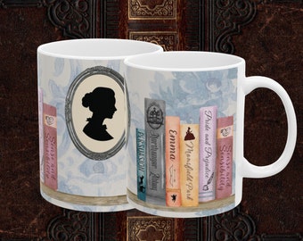 May include: White ceramic mug with a blue and white floral pattern. The mug features a silhouette of a woman in a cameo and a bookshelf with the titles of Jane Austen novels: Sense and Sensibility, Pride and Prejudice, Mansfield Park, Emma, Northanger Abbey, and Persuasion.