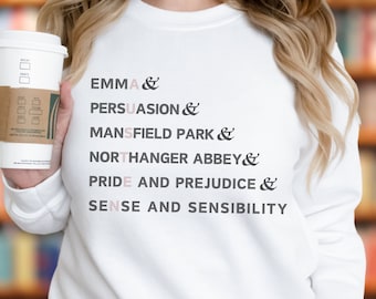 May include: White sweatshirt with the text "EMMA & PERSUASION & MANSFIELD PARK & NORTHANGER ABBEY & PRIDE AND PREJUDICE & SENSE AND SENSIBILITY" printed on the front.