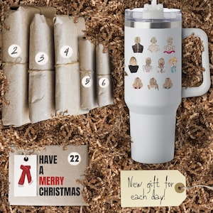 May include: An advent calendar with wrapped gifts and a white tumbler. The tumbler has a handle and is decorated with various hairstyles. The calendar includes a tag that says "Have a Merry Christmas" and "New gift for each day!"
