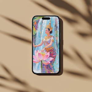 May include: A smartphone case featuring a painting of a woman in traditional Cambodian attire. The artwork depicts a woman with a golden headdress and jewelry, holding a lotus flower in front of a waterfall. The color palette includes pink, purple, gold, and blue.