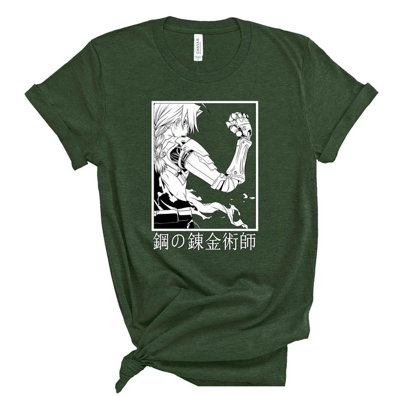 May include: Dark green t-shirt featuring a black and white anime-style illustration inside a white rectangle. The illustration depicts a character with mechanical arm and the Japanese text "Fullmetal Alchemist" below.