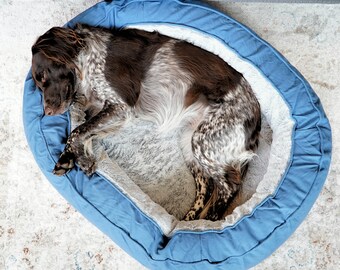 Lit orthopédique pour chien en forme de beignet