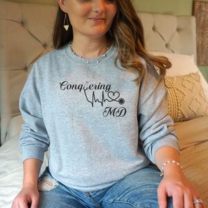 Conquering MD, Personalized Gift for Doctor, Doctor Sweatshirt, Medical School Graduation Gift, Doctor Gift for Women, Student doctor, PHD