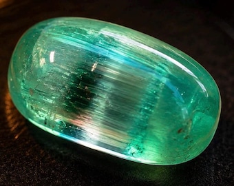67.75 cts - one of a kind natural green cats eye tourmaline.