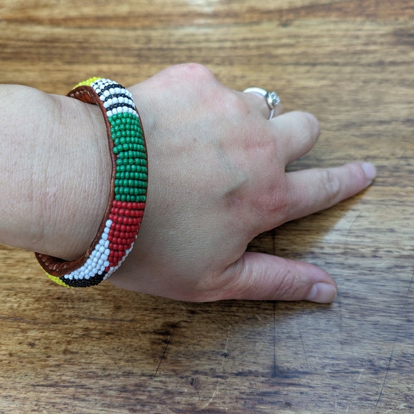 West African leather bracelets. Brown leather with colour beading.