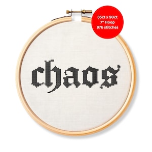 May include: A cross-stitch embroidery hoop with the word "chaos" stitched in black on white fabric. The wooden hoop is 7 inches in diameter and contains 976 stitches. A red circle in the upper right corner provides additional details.