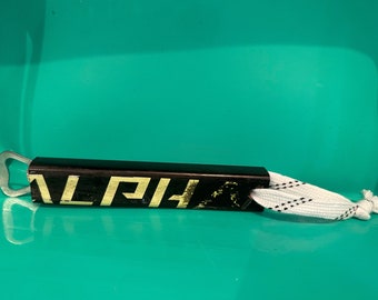Warrior Alpha Hockey Stick Bottle Opener