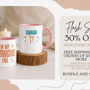 May include: Two white ceramic mugs with pink handles and interiors. One mug says "IN MY SHOWGIRL ERA" and the other says "SARAH" with a bow graphic. A "Flash Sale" graphic is on the right.