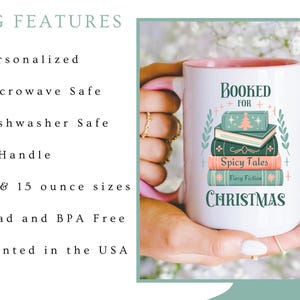 May include: White ceramic mug with a pink rim and handle. The mug features a stack of books with the text "Booked for Christmas" and "Spicy Tales" and "Flurry Fiction". The mug is 11 or 15 ounces and is microwave and dishwasher safe.