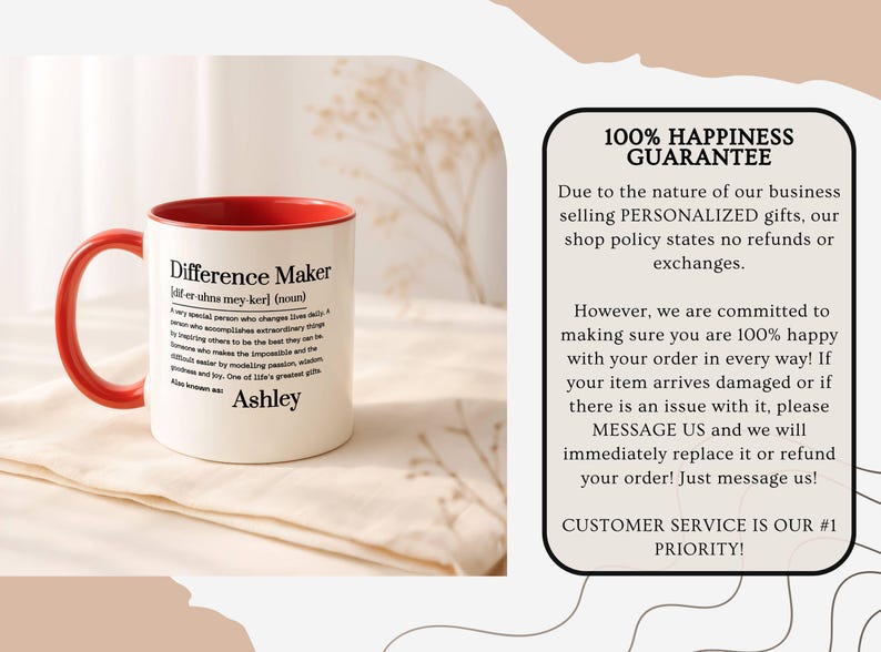 May include: A white ceramic mug with a red interior and handle. The mug features the text "Difference Maker" with a definition and the name "Ashley". The mug is on a white cloth.