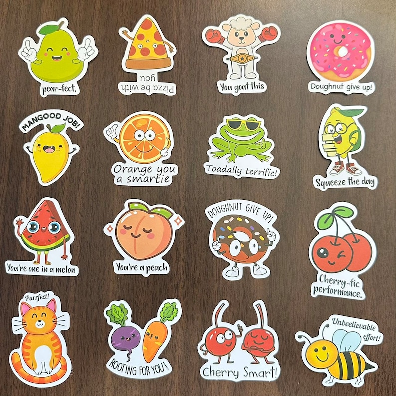 May include: A collection of sixteen die-cut vinyl stickers featuring cartoon characters of fruits, vegetables, and animals with puns. Designs include a pear, pizza slice, goat, donut, mango, orange, frog, lemon, watermelon, peach, cherry, cat, beet, carrot, and bee.