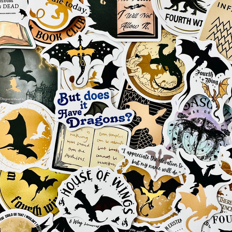 May include: A collection of stickers featuring dragons, books, and quotes. The stickers are mostly black and gold with some white and blue accents. The stickers are arranged in a random pattern on a white background. The text on the stickers includes "But does it have dragons?", "House of Wings", "Fourth Wing", and "I will not allow it."