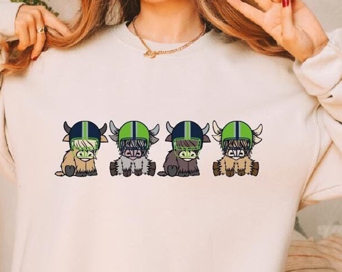 Seattle Football Sweatshirt, Seattle Football Highland Cows Sweater, Seattle Football Cows Helmets Hoodie, Seattle Football Sweatshirt