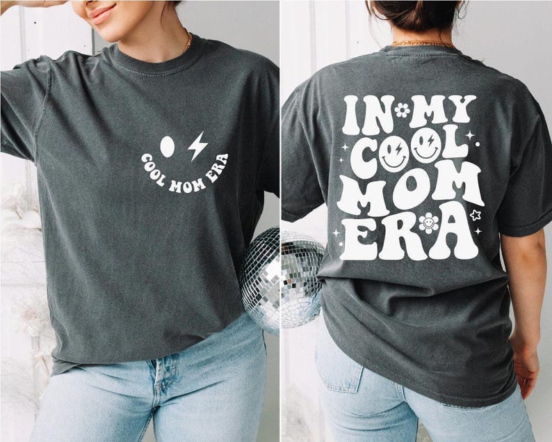 a woman wearing a t - shirt that says in my cool mom era
