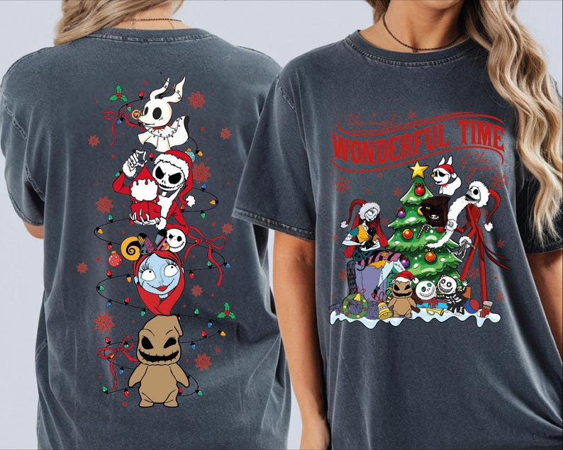 a gray t-shirt with a design of various characters from the movie "The Nightmare Before Christmas" and Christmas-themed elements.