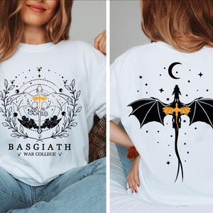 a woman wearing a t - shirt with a bat on it