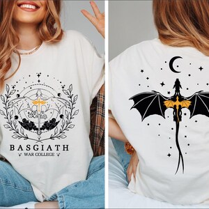 a woman wearing a t - shirt with a bat on it