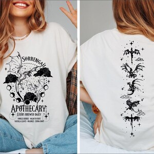 a woman wearing a t - shirt with a graphic on it