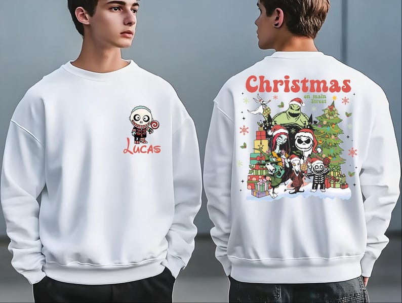 A white sweatshirt with a Christmas-themed design featuring characters from the movie " jack Skellington".