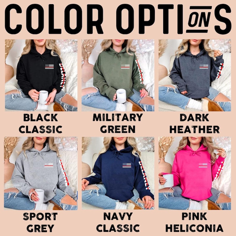 May include: Six different color options for a hooded sweatshirt with a small American flag on the front and a larger American flag on the sleeve. The colors are black, military green, dark heather, sport grey, navy, and pink.