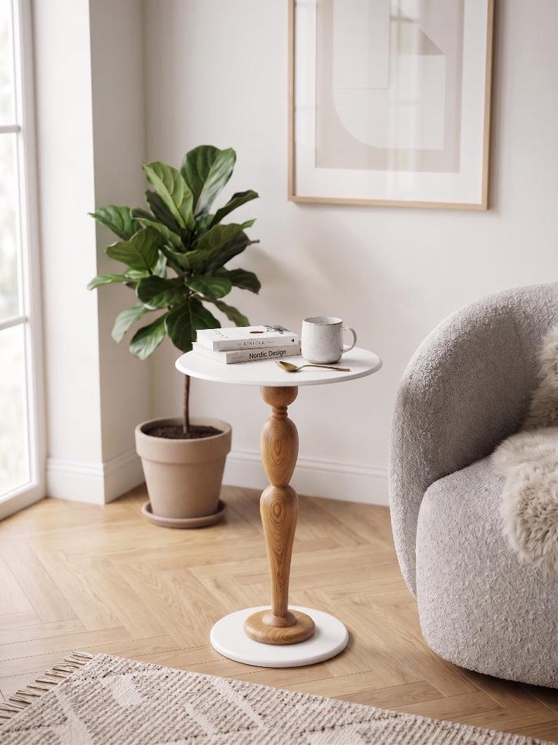 Handmade Wooden & Metal Pedestal Side Table – Sculptural Accent End Table, Modern Rustic Living Room Sofa Table, Luxury Minimal Home Decor

Add timeless elegance to your space with this handmade wooden and metal pedestal side table, designed as both a functional piece of furniture and a sculptural statement.

This unique accent table features a beautifully crafted solid wood tabletop paired with a durable metal pedestal base, creating the perfect balance of warmth and modern sophistication.