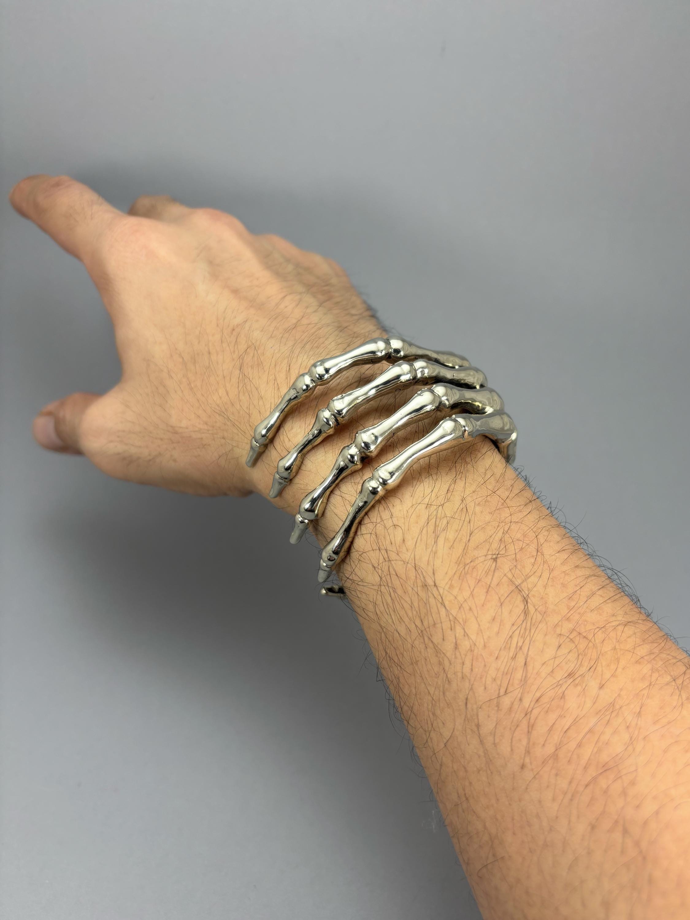 Skeleton Hand Bone Bangle Bracelet Handcuff. Available in 2 