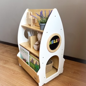 Porte-fusée rotatif pour livres et jouets pour enfants avec planche à dessin magnétique, bibliothèque mobile pour enfants dans l'espace \ étagère cosmique sur roues \ blanc