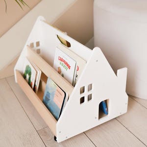 Estantería giratoria para libros con forma de casa y ruedas, estantería móvil para libros, estantería para libros para niños, estantería portátil para libros, estantería de exhibición para niños.